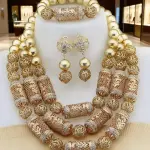 Gold-colored African wedding jewelry set: copper necklace, bracelet, earrings